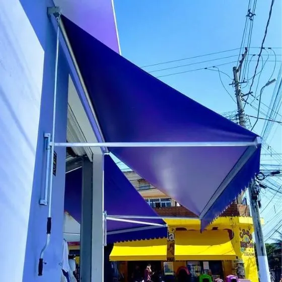 Toldo Cortina com Braços Laterais em Vila Nova, Santana de Parnaíba - SP Toldo Cortina com Braços Laterais em Vila Nova, Santana de Parnaíba - SP — Instalação em garagem residencial