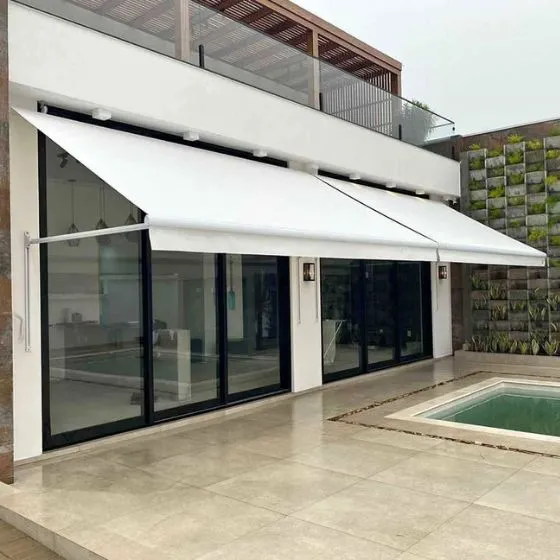 Toldo Cortina com Braços Laterais em Vila Nova, Santana de Parnaíba - SP Toldo Cortina com Braços Laterais em Vila Nova, Santana de Parnaíba - SP — Instalação em estacionamento