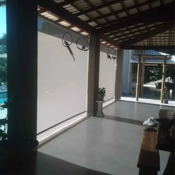 Toldo Cortina de Tela Screen em Parque Paraíso, Santana de Parnaíba - SP — Cobertura em passagem coberta entre ambientes